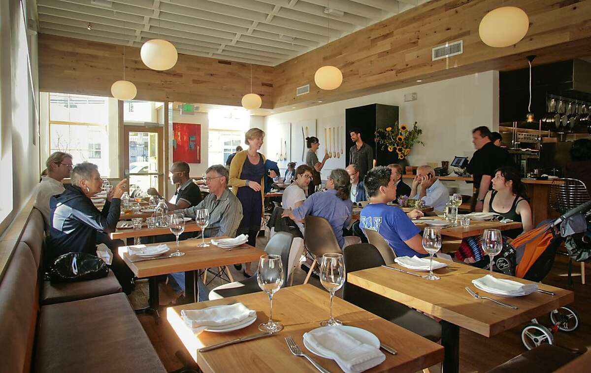 The 50-seat dining room at Piccino with its ball lights and painted rough wood ceiling captures the spirit of the emerging Dogpatch neighborhood.