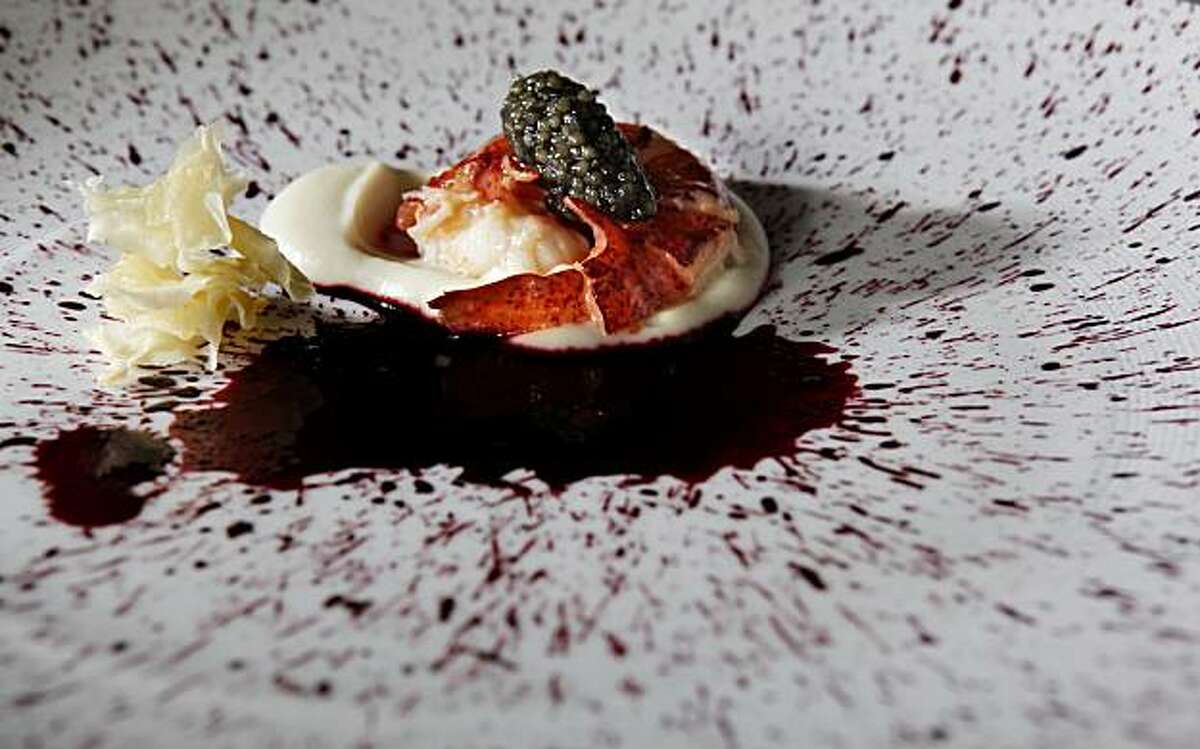 The lobster with black truffles, sunchoke puree, and red beet essence on the chef's tasting menu at the Ritz Carlton Restaurant in San Francisco, Calif., on Wednesday, March 9, 2011.