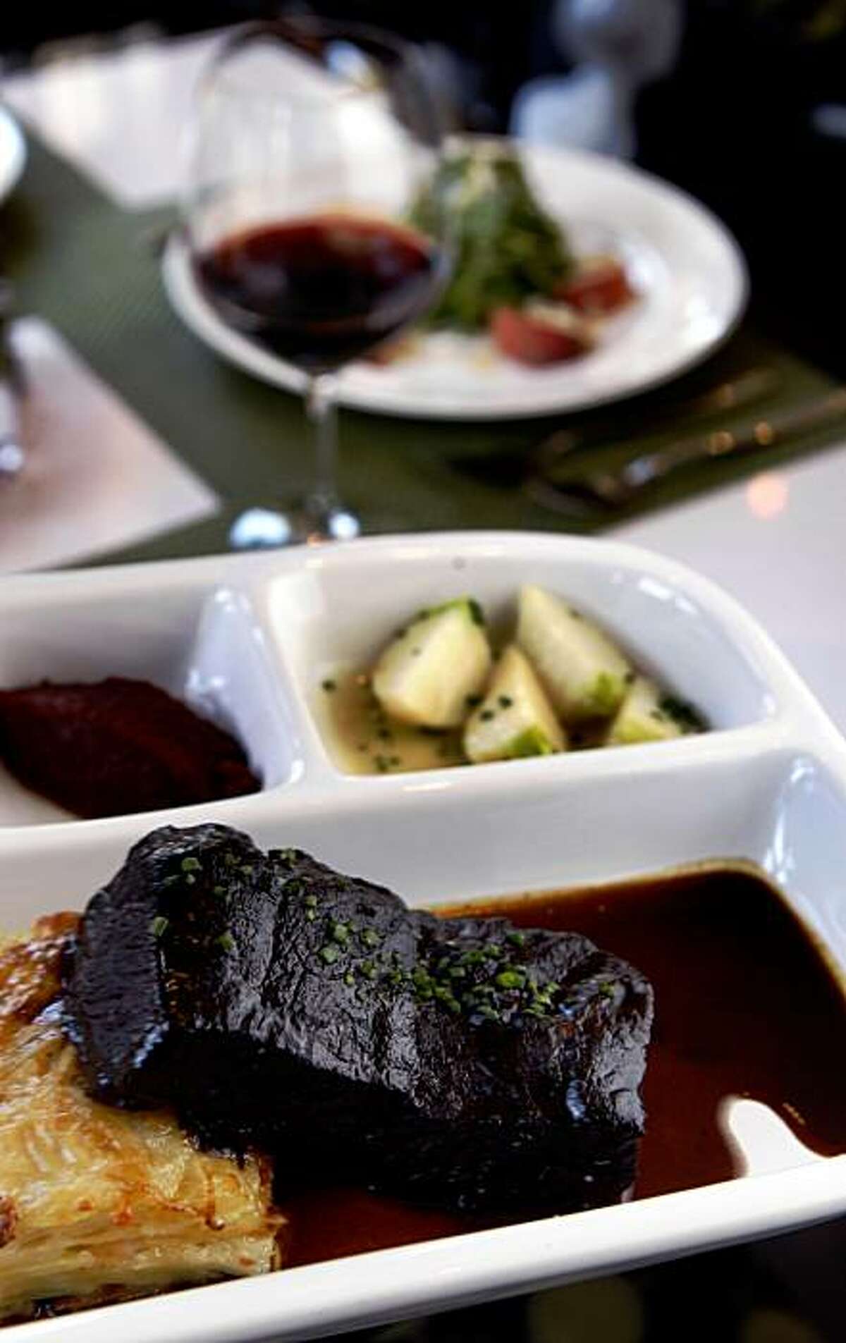 The new modern Bistro in Berkeley, Five on Allston Way offers a verity of main dishes including Short rib "pot roast" seved with cheddar potato gratin.