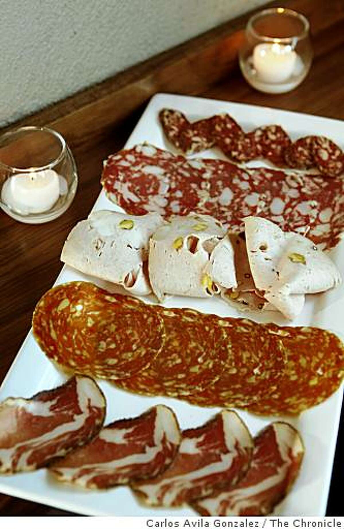Chef's salumi platter, served at Adesso. Adesso is a new restaurant in Oakland that does exceptional salumi and pates.