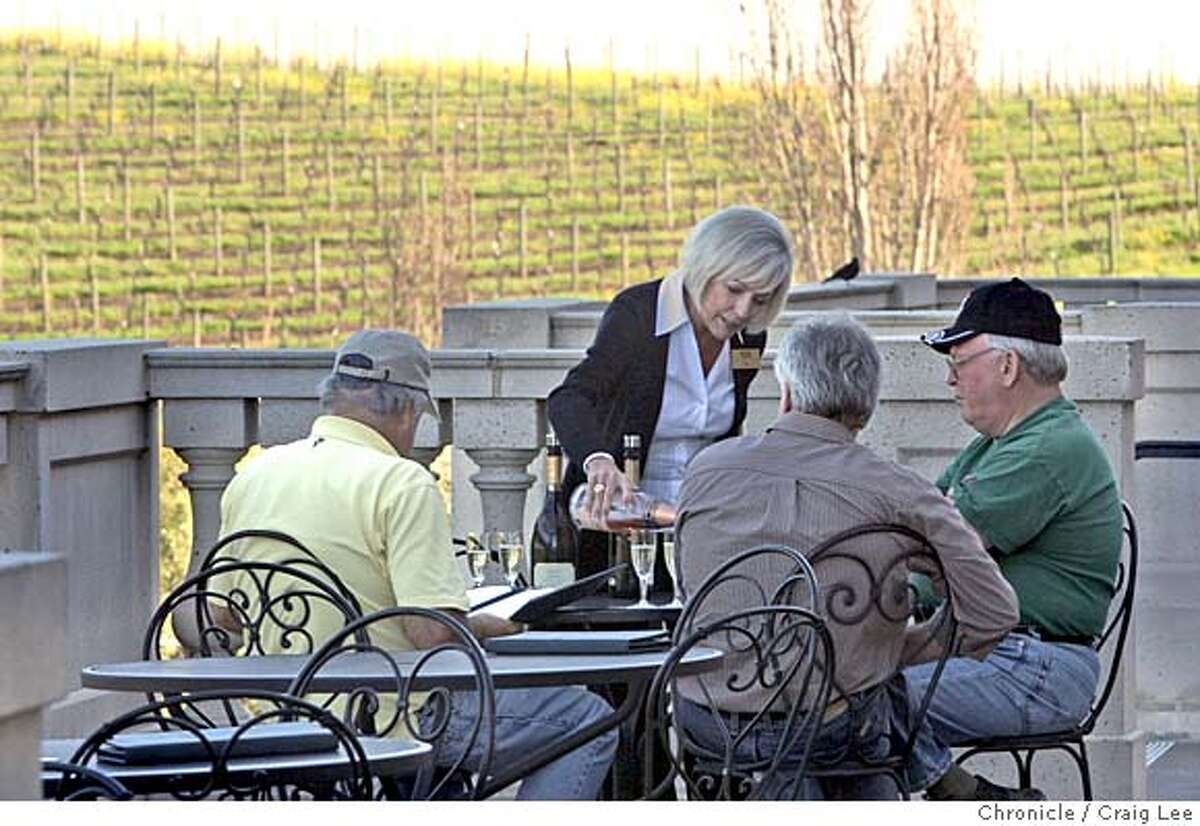 ###Live Caption:Wine club host Peggy Ahrens serving sparkling wine samplers at Domaine Carneros in Napa, Calif., on Thursday, February 28, 2008. Left to right seated--Milton Meler, owner from Montecito Hills wines, Thomas Malinowski from Virginia, and Pat Tobin, winemaker from Bobtail Cellars in Westchester, Calif. Photo by Liz Hafalia / San Francisco Chronicle###Caption History:Wine club host Peggy Ahrens serving sparkling wine samplers at Domaine Carneros in Napa, Calif., on Thursday, February 28, 2008. Left to right seated--Milton Meler, owner from Montecito Hills wines, Thomas Malinowski from Virginia, and Pat Tobin, winemaker from Bobtail Cellars in Westchester, Calif. Photo by Liz Hafalia / San Francisco Chronicle###Notes:Wine club host Peggy Ahrens serving sparkling wine samplers at Domaine Carneros in Napa, Calif., on Thursday, February 28, 2008. Left to right seated--Milton Meler, owner from Montecito Hills wines, Thomas Malinowski from Virginia, and Pat Tobin, winema###Special Instructions:�2008, San Francisco Chronicle/ Liz Hafalia MANDATORY CREDIT FOR PHOTOG AND SAN FRANCISCO CHRONICLE. NO SALES- MAGS OUT.