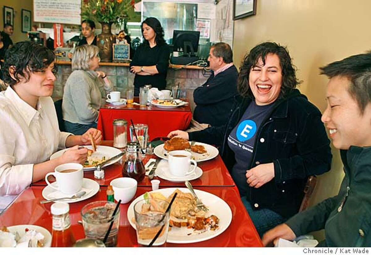 BARGAINBITE_033_KW_.jpg (L to R) Maricella Herrera and Claudia von Vacano (CQ) from Oakland eat breakfast at Cock-A-Doodle Cafe in Oakland on Washington Street that hustles and bustles with the Sunday crowd January 21, 2007. In the background Hostess Ana Trujillo chats with customers Shari and Dave Dunn of Oakland. Kat Wade/The Chronicle Mandatory Credit for San Francisco Chronicle and photographer, Kat Wade, Mags out