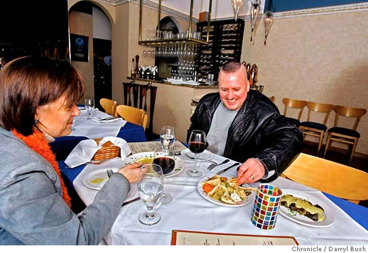 dining17_0060_db.JPG John and Lydia Damian of Napa enjoy dining at Estia Restaurant, a small Greek restaurant in North Beach. Event on 3/15/06 in San Francisco. Darryl Bush / The Chronicle MANDATORY CREDIT FOR PHOTOG AND SF CHRONICLE/ -MAGS OUT