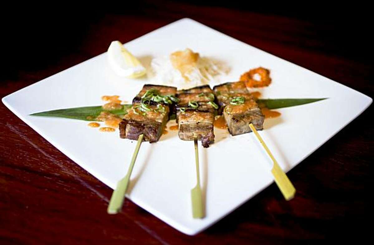 Buta, or Kurobuta pork belly skewers with spicy miso served at Ozumo in Oakland, Calif. on Monday, Aug. 10, 2009.
