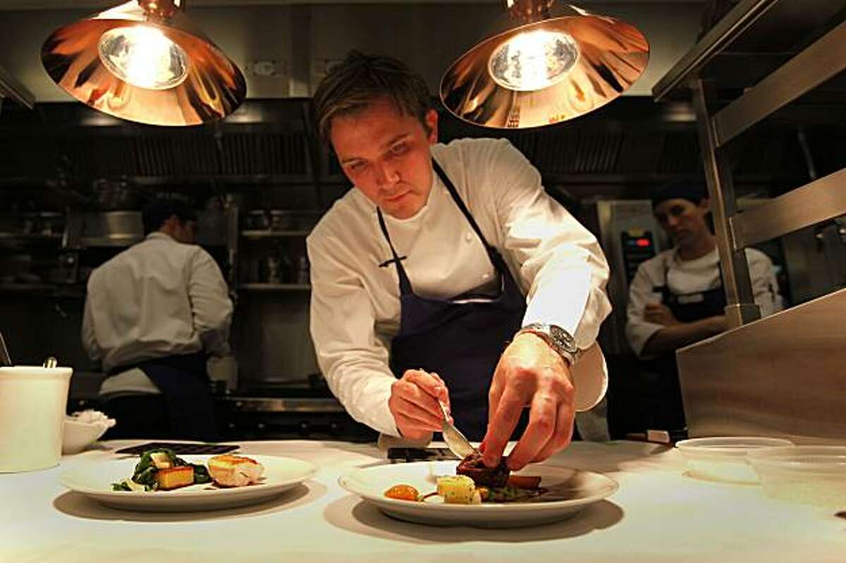 Executive Chef, Jason Berthold prepares at the new Michael Mina restaurant, "RN74", in San Francisco, Calif., on Tuesday April 21,2009. The restaurant is located on the street level of the Millenium Towers at 301 Mission St.