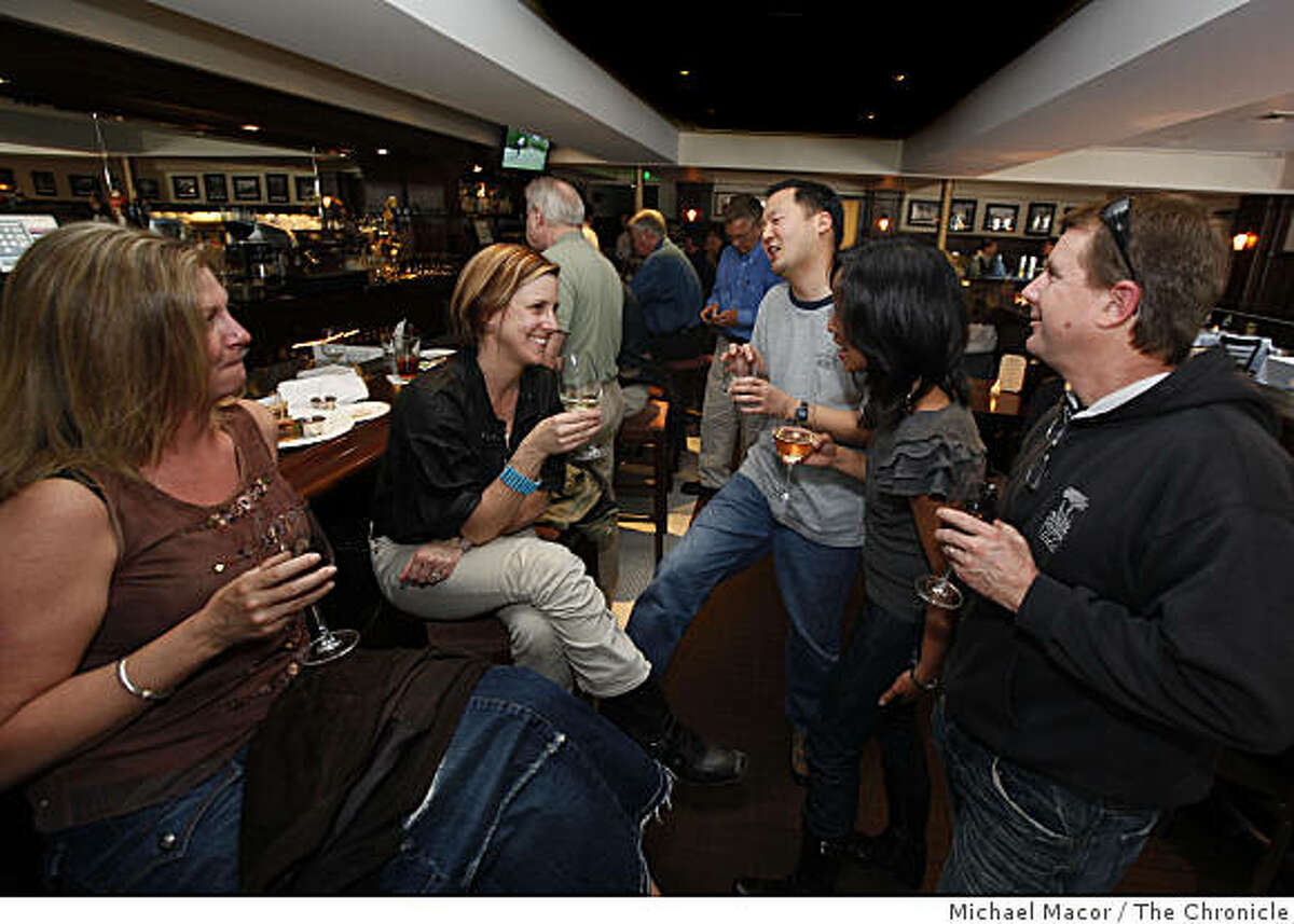 Dawn Davis, Aimee Westbrook, Doug Lee, Carol Lee and Bob Westbrook, (left to right) all from Mill Valley, enjoying the bar scene at the, "Balboa Cafe", in Mill Valley, Calif., on Friday April 10, 2009.