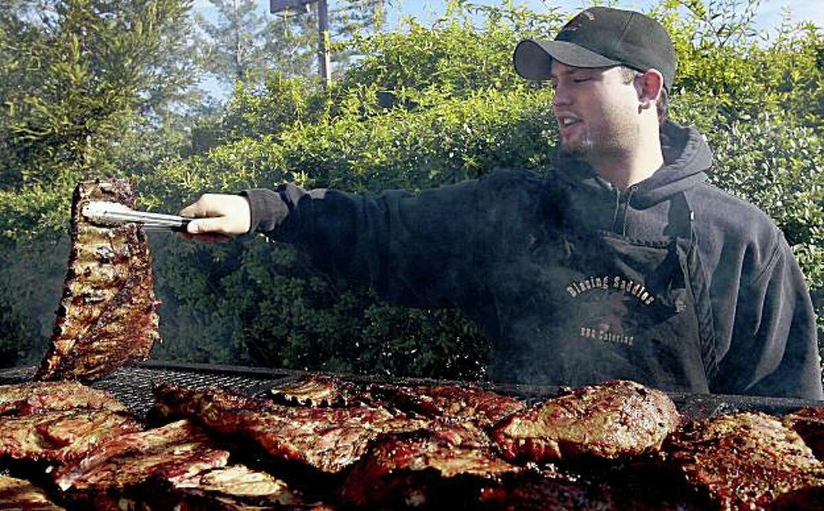 Dominic Corsi is photographed while grilling at Blazing Saddles BBQ in Santa Rosa, Calif. on Thursday, December 11, 2008.