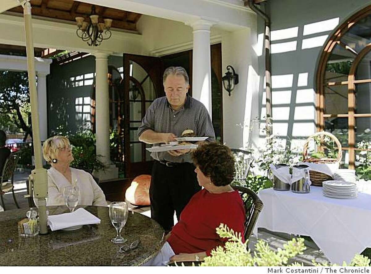Diners are served at the French Garden in Sebastopol, Calif., on Wednesday, October 8, 2008.