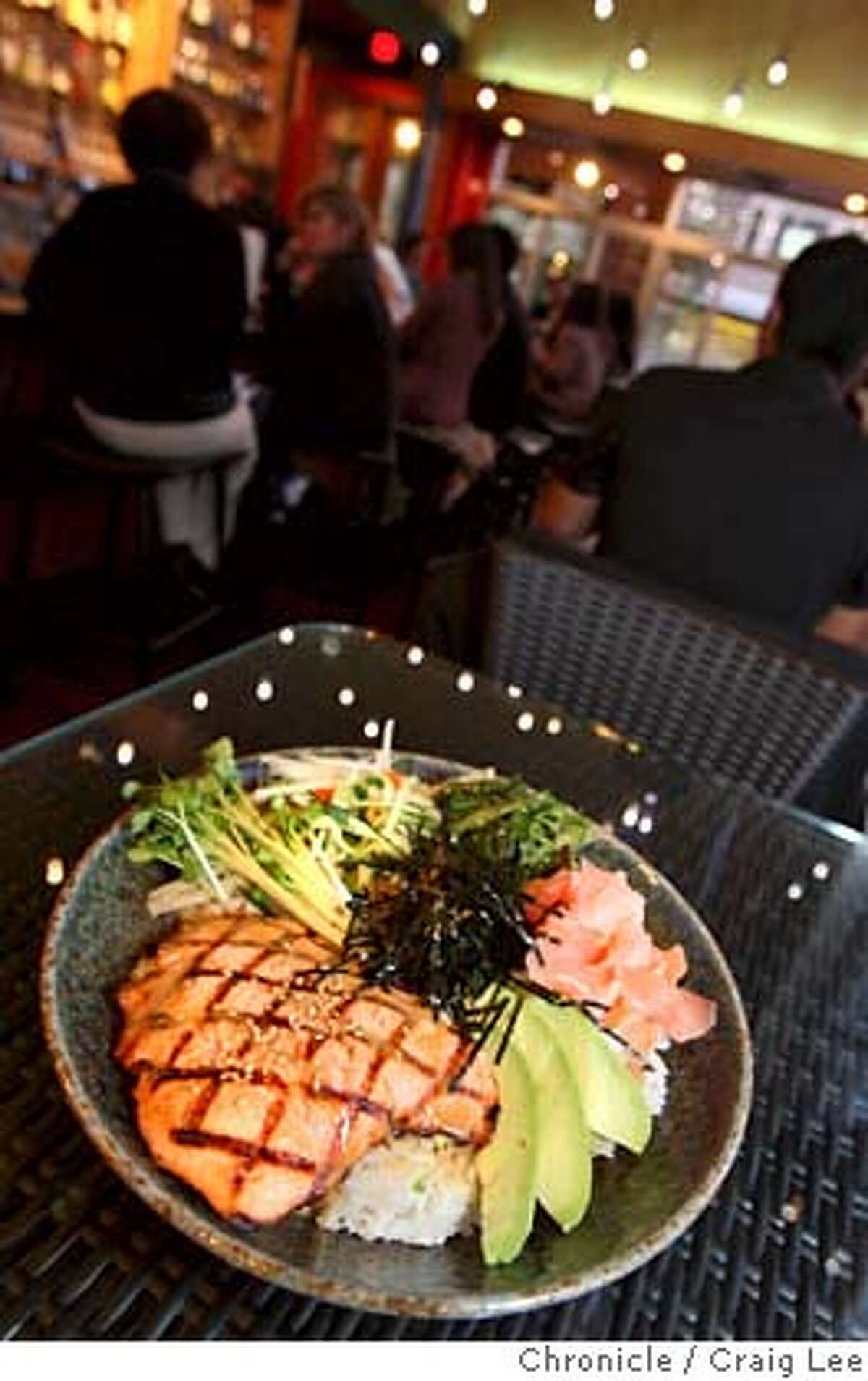 ###Live Caption:A salmon wasabi rice bowl is photographed in the bar area of the restaurant. Pacific Catch is located at 1200 Ninth Ave. in San Francisco. Photo by Brant Ward / San Francisco Chronicle###Caption History:A salmon wasabi rice bowl is photographed in the bar area of the restaurant. Pacific Catch is located at 1200 Ninth Ave. in San Francisco. Photo by Brant Ward / San Francisco Chronicle###Notes:###Special Instructions: