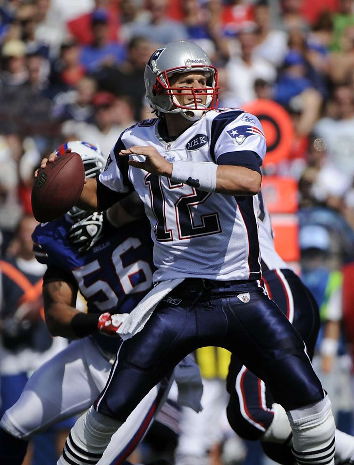 New England Patriots' Tom Brady throws against the Buffalo Bills during the second half of an NFL football game in Orchard Park, N.Y., Sunday, Sept. 25, 2011. (AP Photo/Gary Wiepert)