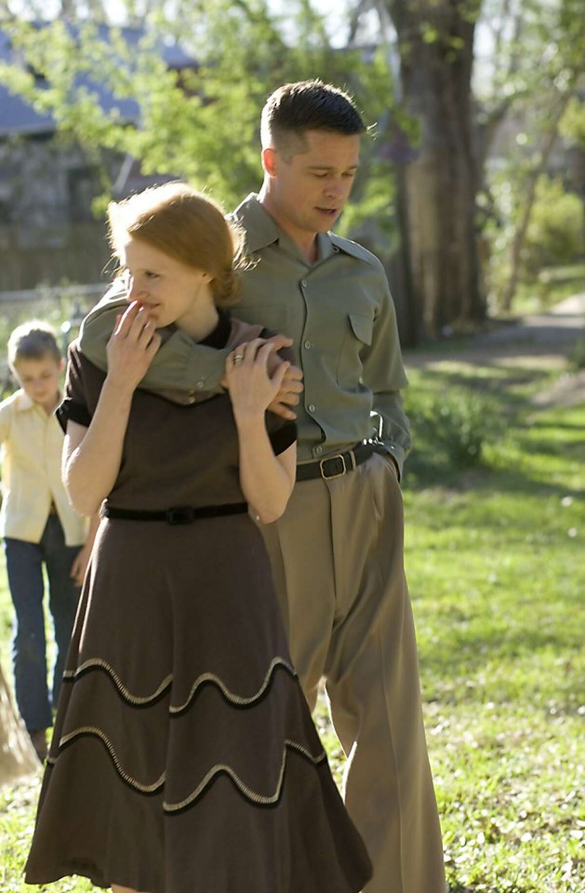 from left: Jessica Chastain and Brad Pitt in The Tree of Life. Ran on: 06-03-2011 Jessica Chastain and Brad Pitt, top, are the parents of three boys in Tree of Life. Ran on: 06-19-2011 Jessica Chastain and Brad Pitt in The Tree of Life: ambitious but long.