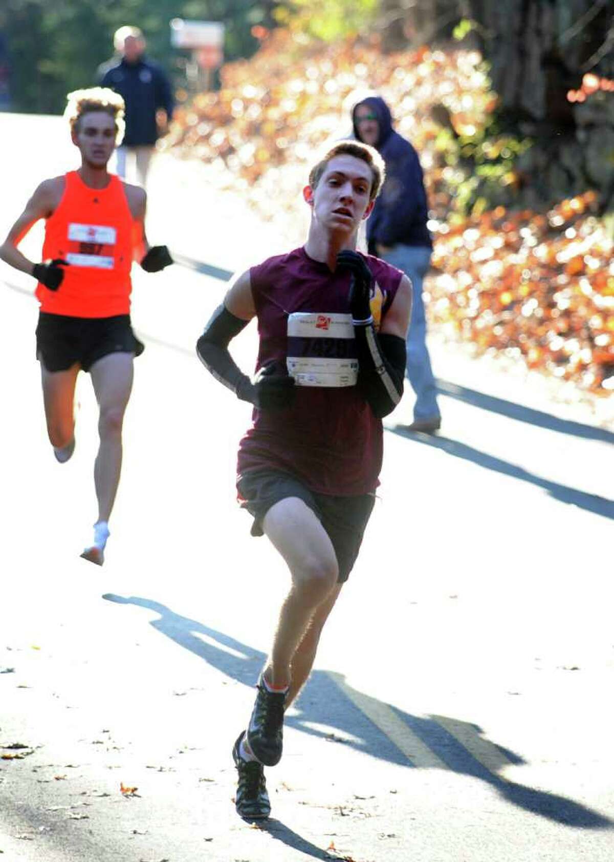 Henry Wynne, of Westport, finishes the annual Pequot Road Runners Turkey Day Trot in second place Thursday, Nov. 24, 2011 in Southport, Conn.