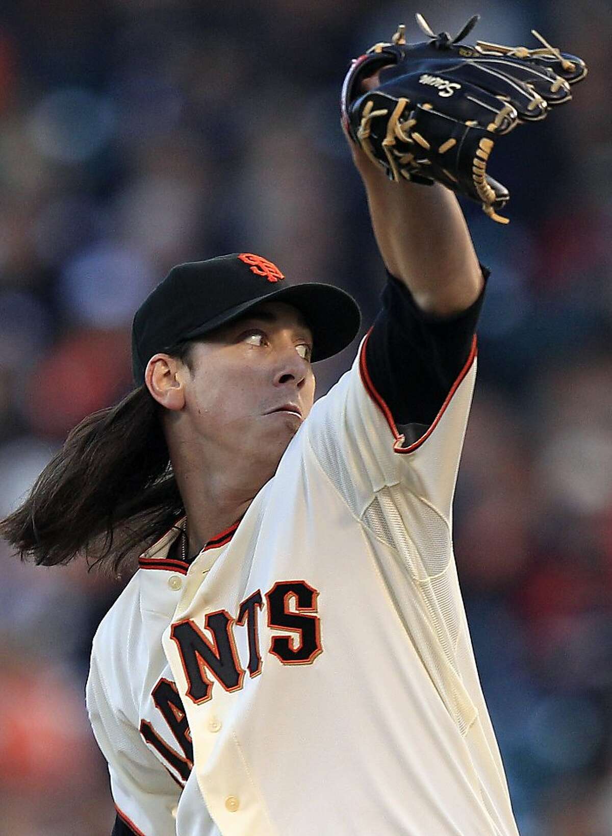 San Francisco Giants starting pitcher Tim Lincecum throws to the Chicago Cubs during the first inning of a baseball game in San Francisco, Monday, Aug. 29, 2011. (AP Photo/Marcio Jose Sanchez)