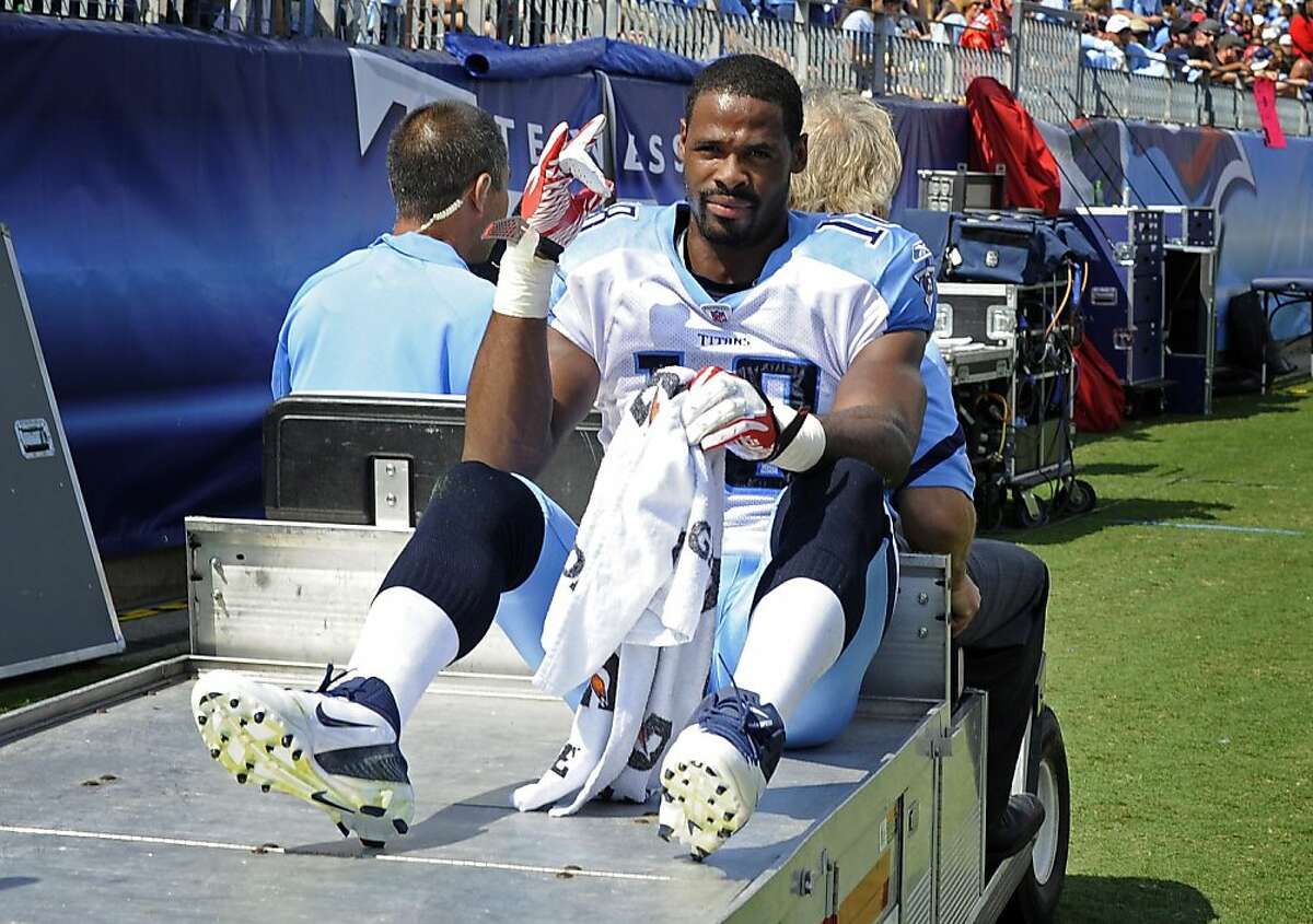 Tennessee Titans wide receiver Kenny Britt (18) is taken off the field after being injured on a play in the second quarter of an NFL football game against the Denver Broncos on Sunday, Sept. 25, 2011, in Nashville, Tenn. (AP Photo/The Tennessean, George Walker IV) NO SALES