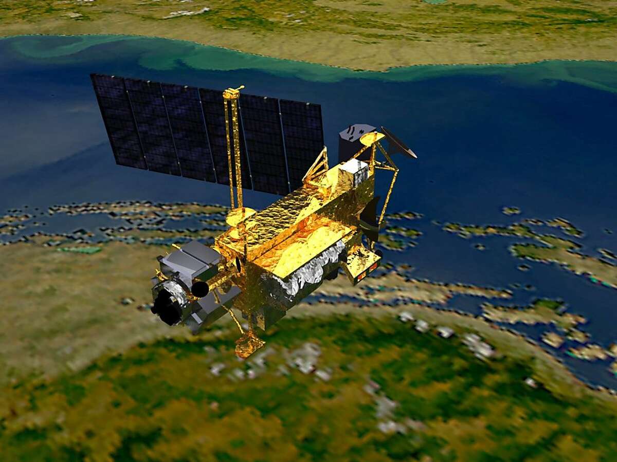 This undated NASA handout image recieved September 14, 2011 shows a conceptual image of the Upper Atmosphere Research Satellite, UARS launched on September 15, 1991, by the space shuttle Discovery. The six-ton NASA satellite hurtled toward Earth on September 23, 2011, while the site of the crash-landing of the biggest piece of US space junk in 30 years remained a mystery into the final hours. NASA has stressed that the risk is "extremely small" of any of the 26 fragments expected to survive the fiery re-entry into Earth's atmosphere hitting any one of the planet's seven billion people. The US Department of Defense and NASA were busy tracking the debris and keeping all federal disaster agencies informed, a NASA spokeswoman said. The Federal Aviation Administration issued a notice Thursday to pilots and flight crews of the potential hazard and urged them to report any falling space debris and take note of its position and time. AFP PHOTO / HO / NASA = RESTRICTED TO EDITORIAL USE - MANDATORY CREDIT "AFP PHOTO / NASA " - NO MARKETING NO ADVERTISING CAMPAIGNS - DISTRIBUTED AS A SERVICE TO CLIENTS = (Photo credit should read HO/AFP/Getty Images) Ran on: 09-24-2011 NASA offered this conceptual image of the Upper Atmosphere Research Satellite, likely to crash through the atmosphere by early today. Ran on: 09-24-2011 NASA offered this conceptual image of the Upper Atmosphere Research Satellite, likely to crash through the atmosphere by early today.