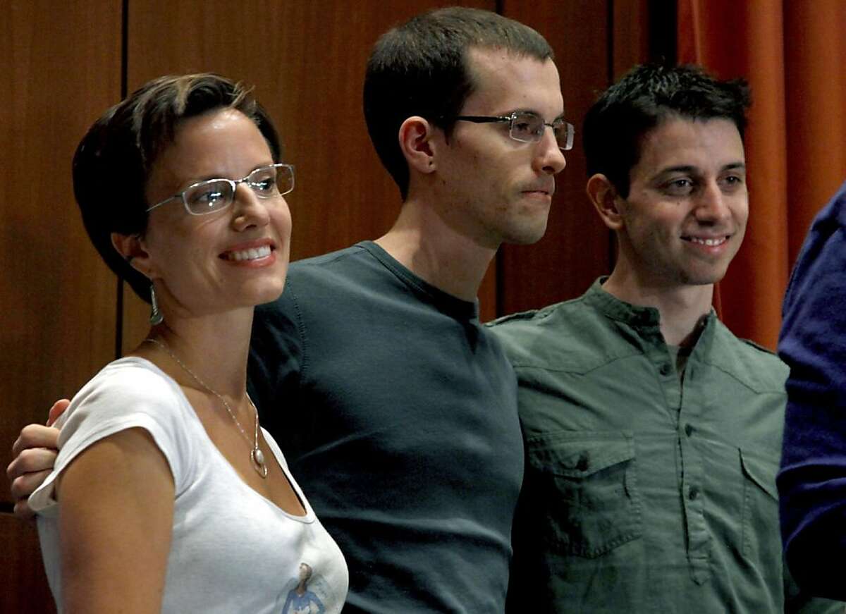 From left, Sarah Shourd, Shane Bauer, and Josh Fattal, stand together after a news conference on Sunday, Sept. 25, 2011 in New York. Fattal and Bauer, both 29, were freed last week under a $1 million bail deal and arrived Wednesday in Oman, greeted by relatives and fellow hiker Shourd, who was released last year. The two American hikers held for more than two years in an Iranian prison. (AP Photo/Craig Ruttle)