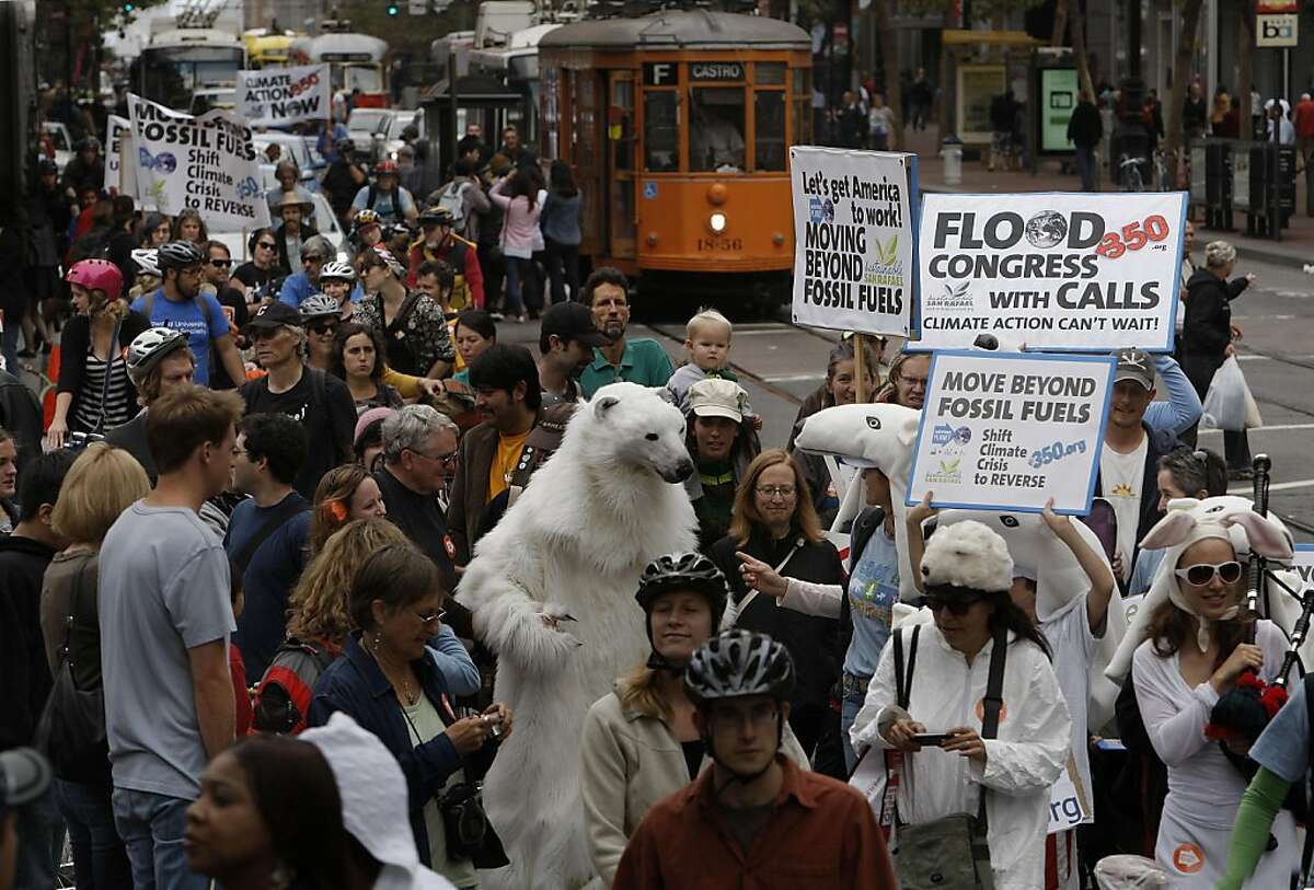 Hundreds joined a parade for "Moving Planet" demanding solutions to climate change, peace and Sustainability, as they moved up Market St. in San Francisco, Ca., on Saturday September 24, 2011, ending at Civic Center Plaza in front of City Hall.