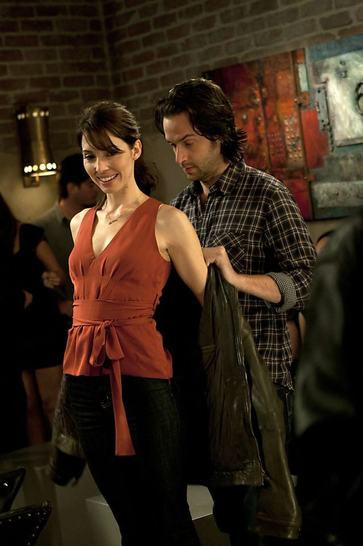 WHITNEY -- "First Date" Episode 102 -- Pictured: (l-r) Whitney Cummings as Whitney, Chris D'Elia as Alex.