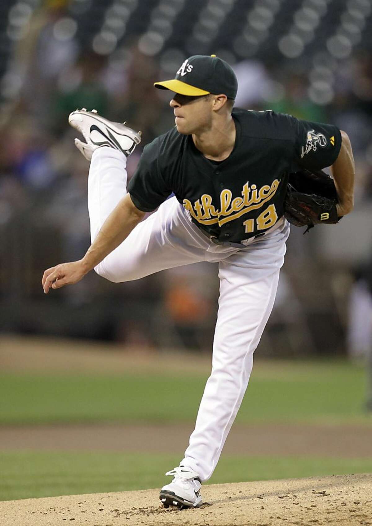 Oakland Athletics' Rich Harden works against the Texas Rangers in the first inning of a baseball game Tuesday, Sept. 20, 2011, in Oakland, Calif. (AP Photo/Ben Margot)