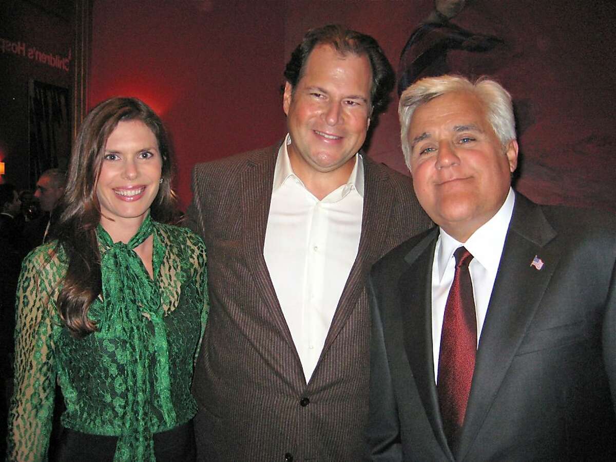 Lynne and Marc Benioff (left) with comedian Jay Leno at Davies Symphony Hall where the Benioff's hosted a concert in support of UCSF's new Benioff Children's Hopsital. Sept 2011. By Catherine Bigelow.