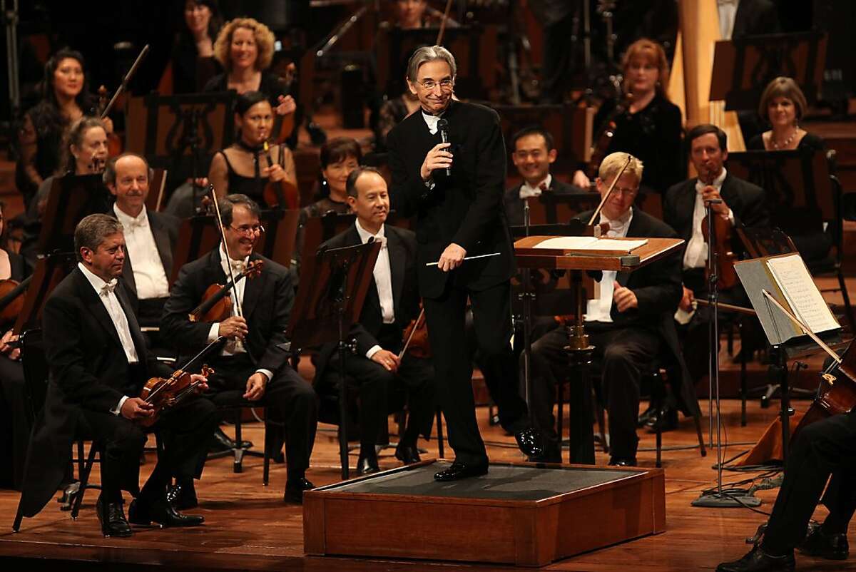 Michael Tilson Thomas with the orchestra after opening with the Star Spangled Banner during the100th anniversary of the SF Syphony in San Francisco, Calif., on Thursday, September 7, 2011.
