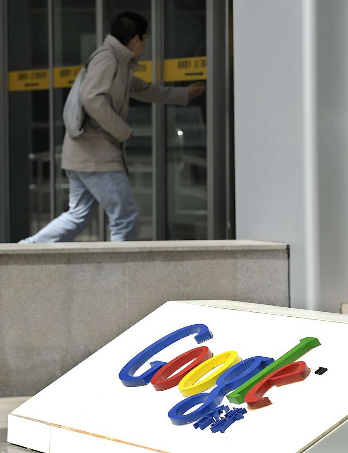 A man walks near the Google company logo outside the Google China headquarters in Beijing on March 21, 2010. Chinese media unleashed a torrent of criticism against Google after reports it would leave the country, with state news agency Xinhua alleging the company was linked to US intelligence. AFP PHOTO/ LIU Jin (Photo credit should read LIU JIN/AFP/Getty Images) Ran on: 03-22-2010 Google is still operating in China, but some reports say it will pull out next month. The company decided to stop censoring search results after it was hacked. Ran on: 04-23-2010 Photo caption Dummy text goes here. Dummy text goes here. Dummy text goes here. Dummy text goes here. Dummy text goes here. Dummy text goes here. Dummy text goes here. Dummy text goes here.###Photo: sector23_google_PH1269043200AFP###Live Caption:A man walks near the Google company logo outside the Google China headquarters in Beijing on March 21, 2010. Chinese media unleashed a torrent of criticism against Google after reports it would leave the country, with state news agency Xinhua alleging thecompany was linked to US intelligence.###Caption History:A man walks near the Google company logo outside the Google China headquarters in Beijing on March 21, 2010. Chinese media unleashed a torrent of criticism against Google after reports it would leave the country, with state news agency Xinhua alleging the company was linked to US intelligence. AFP PHOTO- LIU Jin (Photo credit should read LIU JIN-AFP-Getty Images)____Ran on: 03-22-2010__Google is still operating in China, but some reports say it will pull out next month. The company decided to stop censoring search results after it was hacked.###Notes:###Special Instructions: