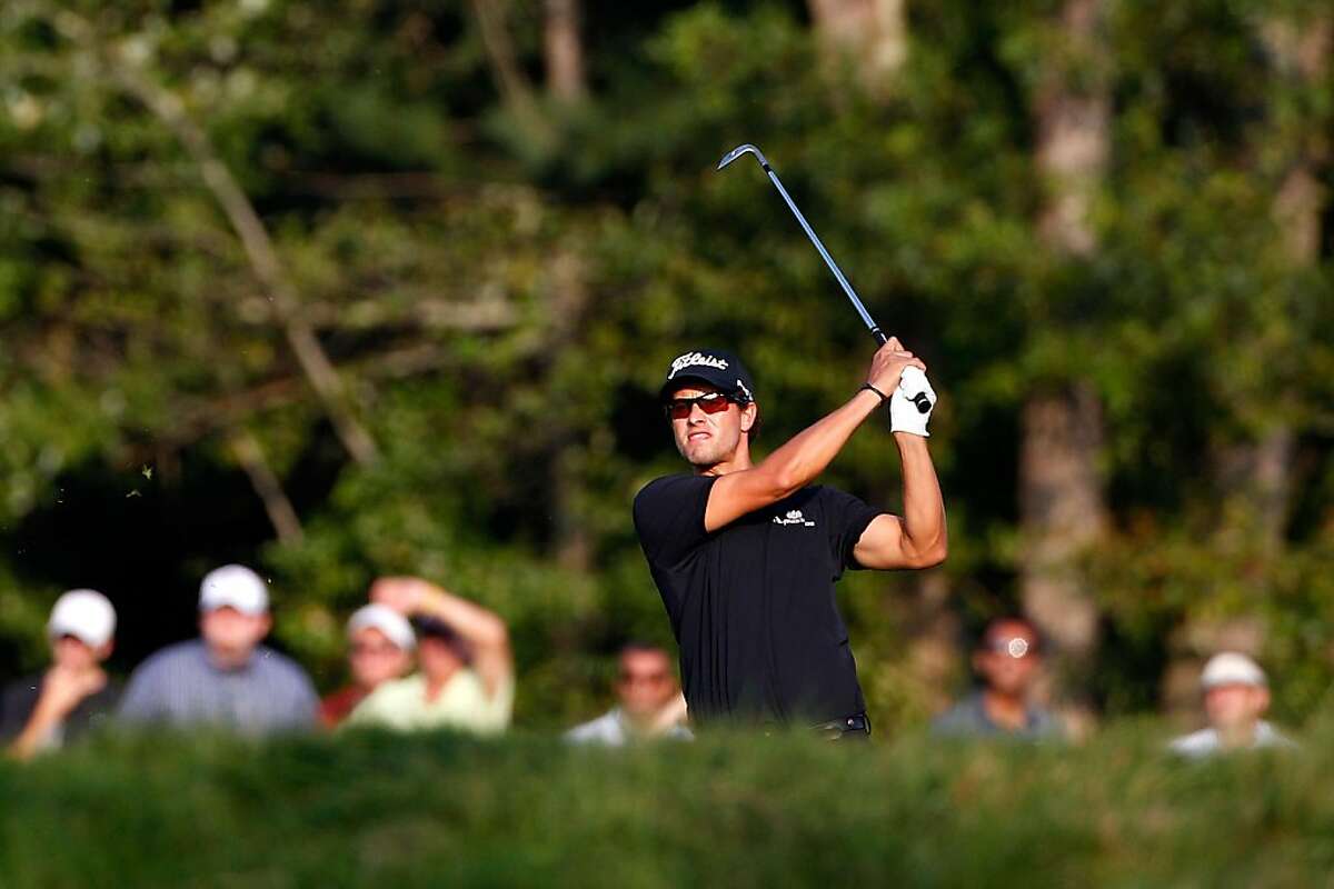 NORTON, MA - SEPTEMBER 03: Adam Scott of AUstralia watches his shot from the fairway on the ninth hole during the second round of the Deutsche Bank Championship at TPC Boston on September 3, 2011 in Norton, Massachusetts. (Photo by Michael Cohen/Getty Images)