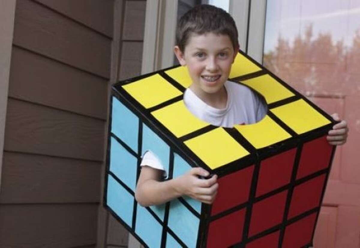 Ralph wears a Rubik's Cube costume for Halloween, made by his mother, ...