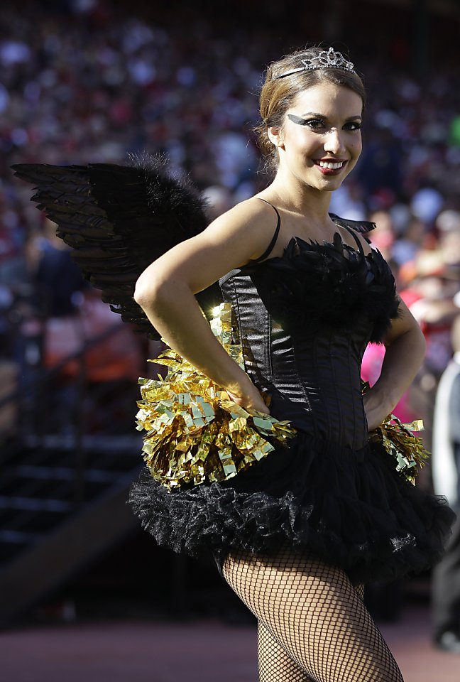 San Francisco 49ers cheerleaders are shown in Halloween costumes