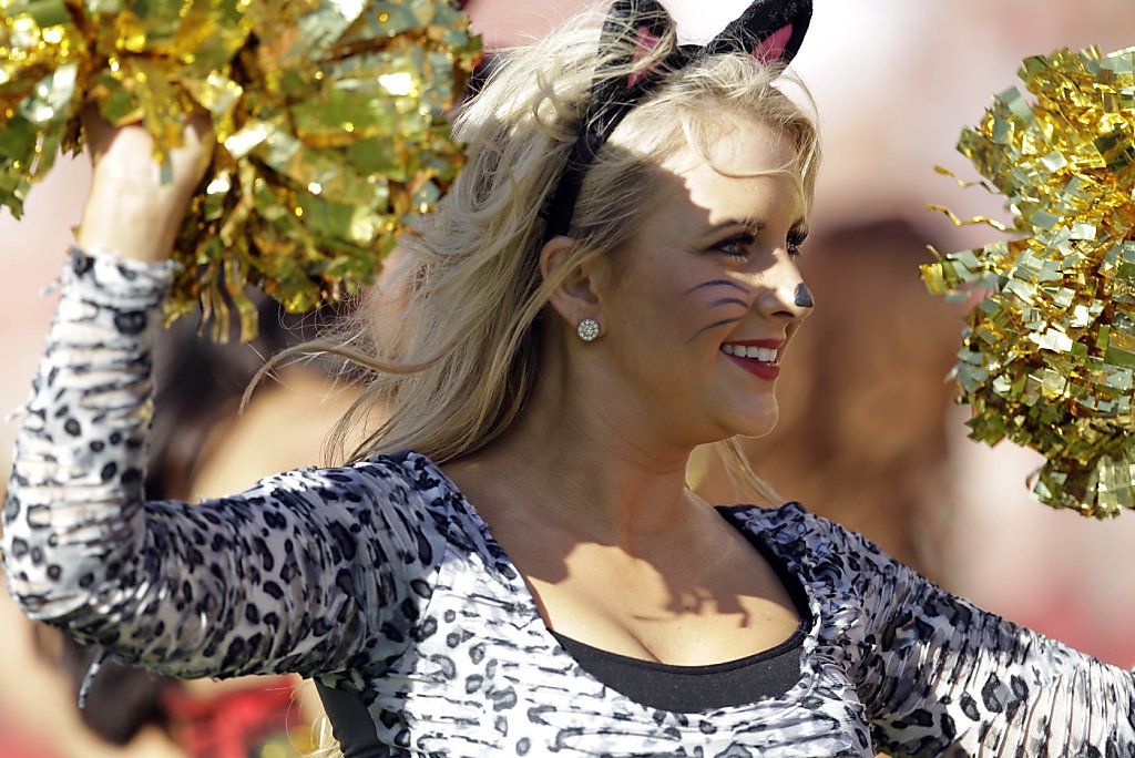 San Francisco 49ers cheerleaders are shown in Halloween costumes