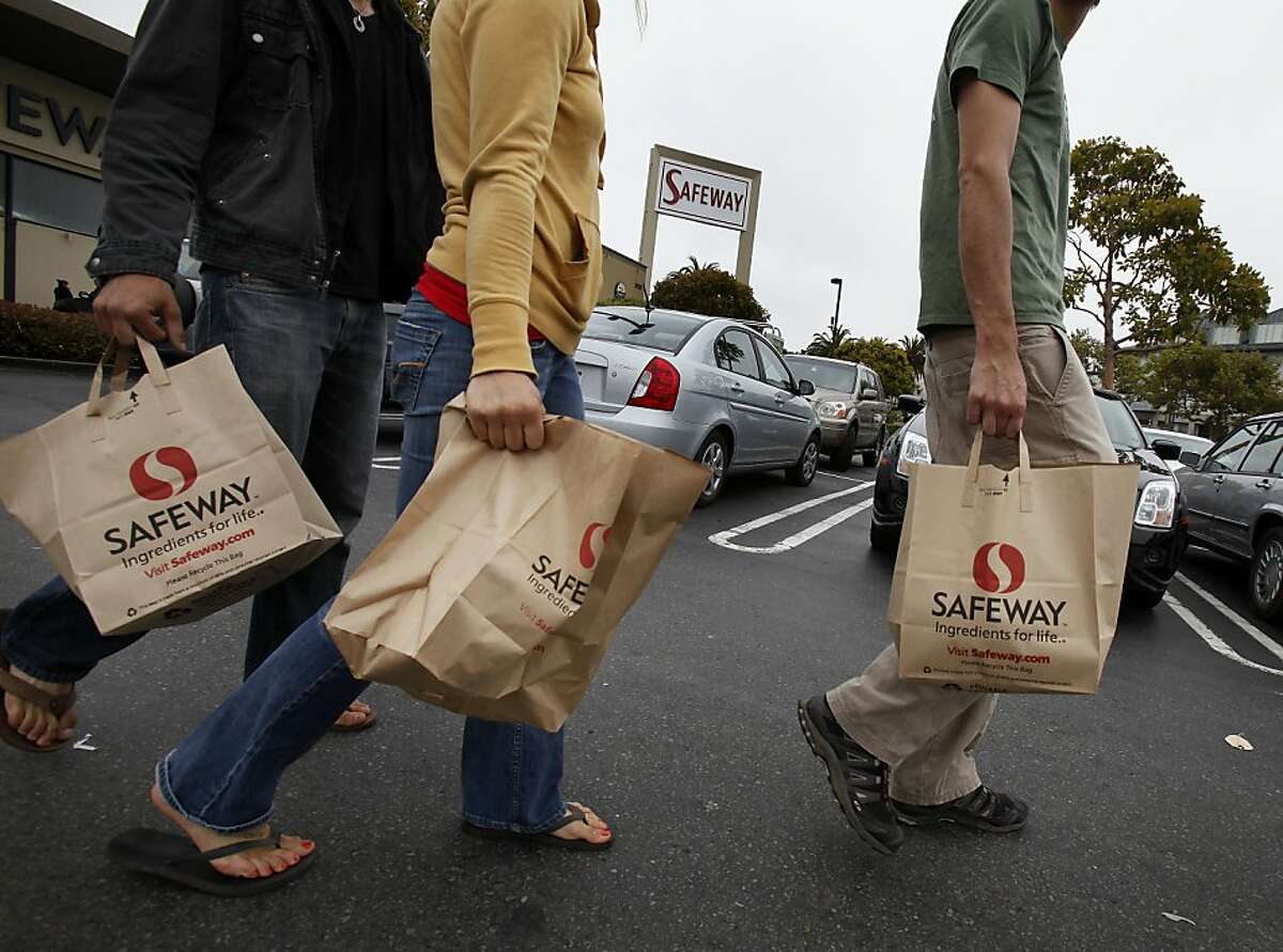 Three Safeway shoppers at the Market Street store headed across the parking lot with their shopping bags unaware of plans to charge for paper and plastic Monday August 2, 2010. They said they use the bags for recycling. San Francisco Supervisor Ross Mirkarimi and others want to begin charging shoppers for the use of paper and plastic bags. Ran on: 08-03-2010 Shoppers leave the Safeway on Market Street. A state bill would impose a minimum 5-cent charge on paper bags. Ran on: 08-04-2010 Shoppers who don't bring a bag soon may face a fee. Ran on: 11-30-2010 San Franciscos proposal to charge shoppers a fee for using paper bags might be in jeopardy under Proposition 26.
