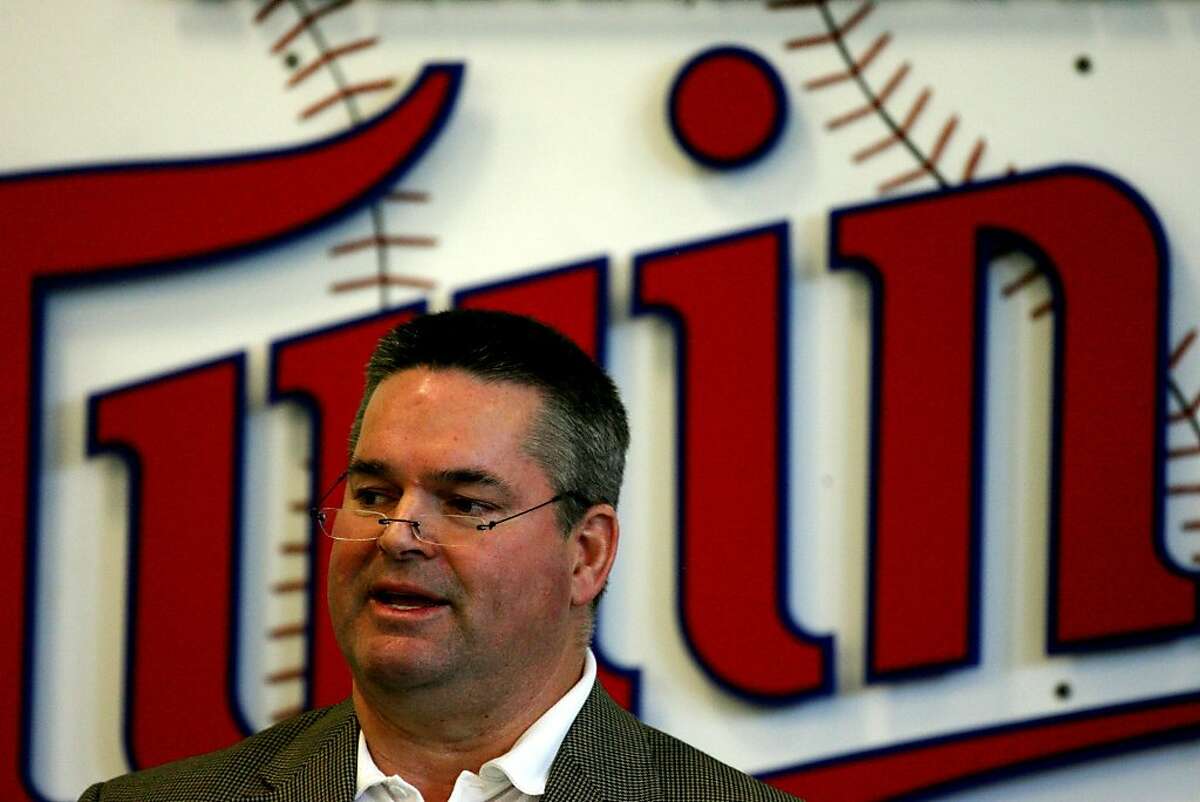 This Feb. 23, 2009 file photo shows Minesota Twins general manager Bill Smith during a news conference in Fort Myers, Fla. The Minnesota Twins have fired general manager Bill Smith and returned Terry Ryan to the role on an interim basis. The change was announced Monday, Nov. 7, 2011. (AP Photo/The Star Tribune, Jerry Holt) PIONEER PRESS OUT MINNEAPOLIS-AREA TV OUT MAGS OUT