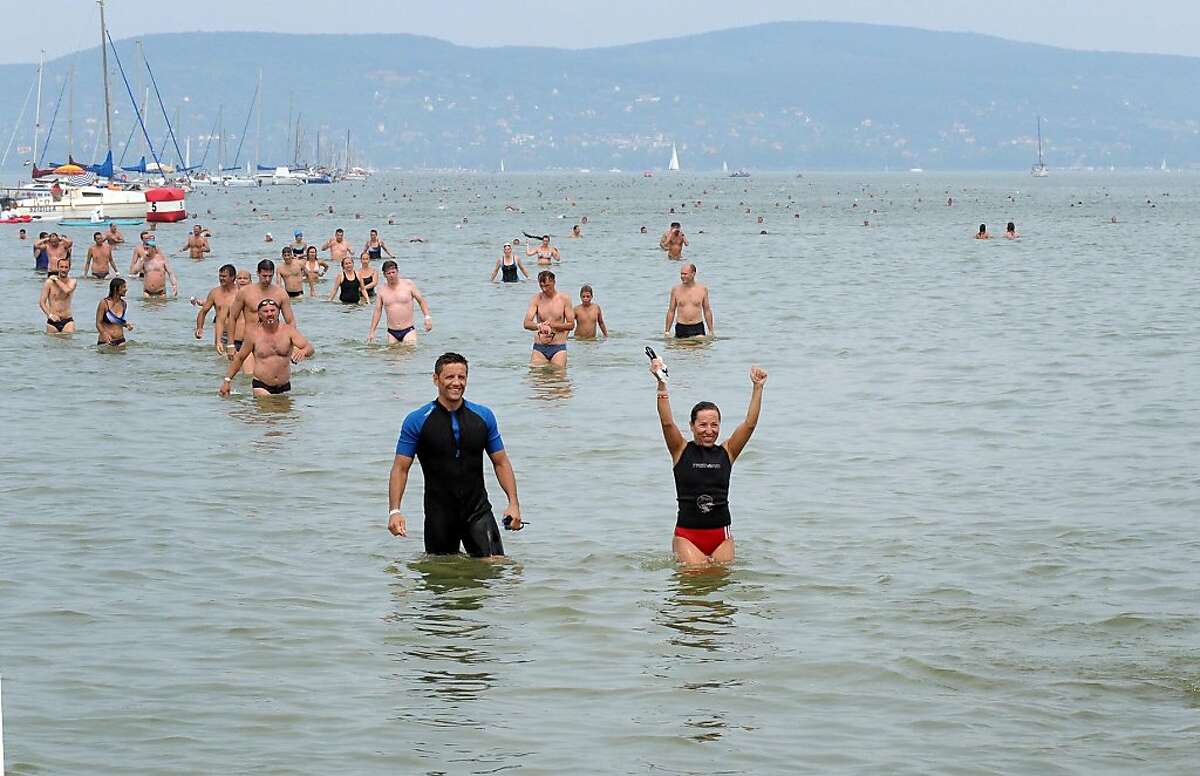 Ambassador Eleni Kounalakis emerges from Lake Balaton after 5.2-kilometer swim in August; she was in the top third of 4,500 participants