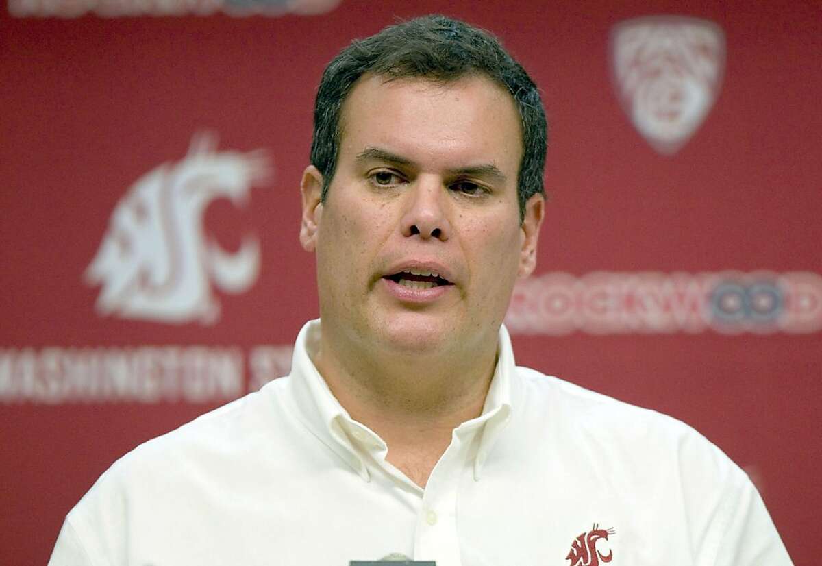 Paul Wulff speaks at a news conference after he was fired as football coach at Washington State, in Pullman, Wash., on Tuesday, Nov. 29, 2011. (AP Photo/Moscow-Pullman Daily News, Geoff Crimmins)