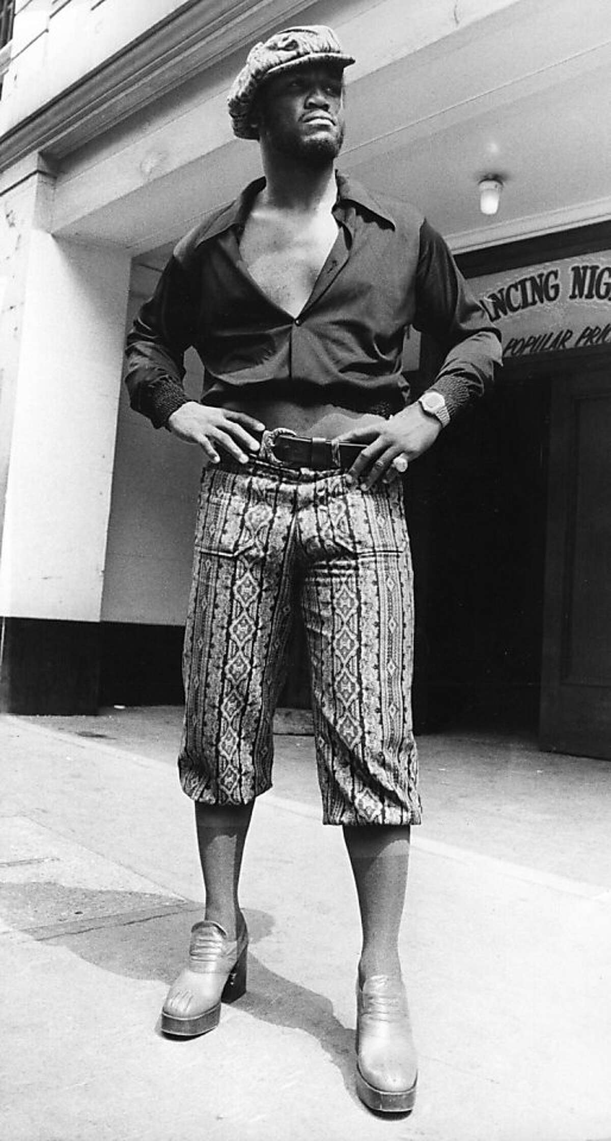 FILE: 26th June 1973: World Champion Heavyweight boxer Joe Frazier models clothing at Leicester Square Empire Ballroom. It was reported that former heavyweight champion Joe Frazier has died after being diagnosed with liver cancer November 7, 2011. (Photo by Keystone/Getty Images)