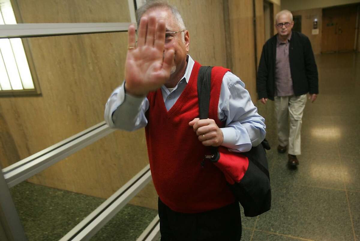 Stephen Herman, former chief administrative services officer at City College of San Francisco, leaves court after being sentenced to five years probation but no restitution for misuse of public funds on Tuesday, Nov. 1, 2011, in San Francisco, Calif.