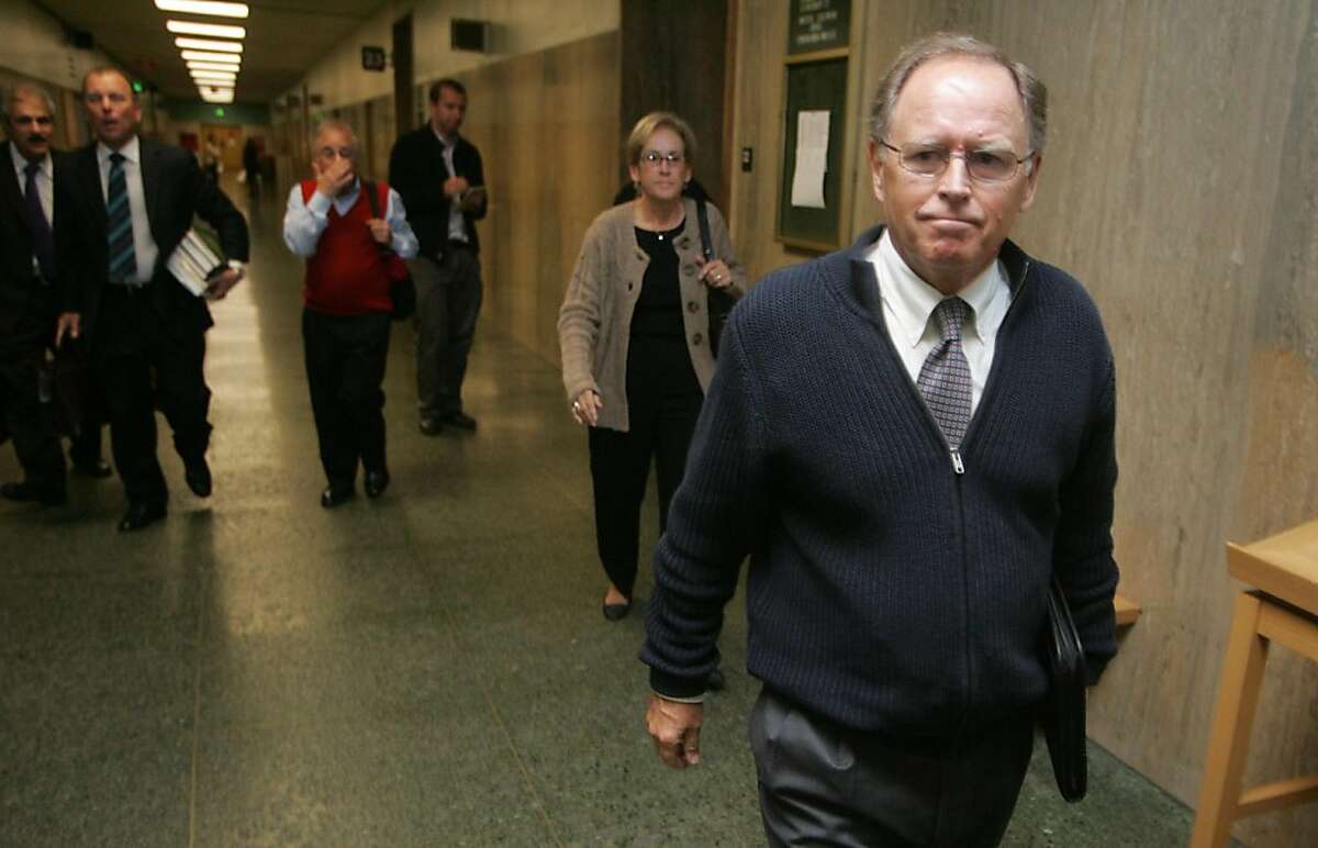 Philip Day, former chancellor of City College of San Francisco, leaves court after being sentenced to five years probation but no restitution for misuse of public funds on Tuesday, Nov. 1, 2011, in San Francisco, Calif.