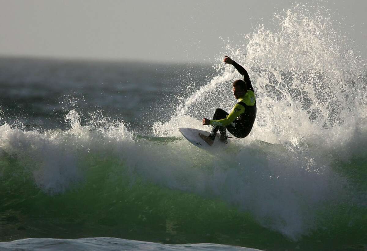 Surfing at Ocean Beach tries to catch a wave