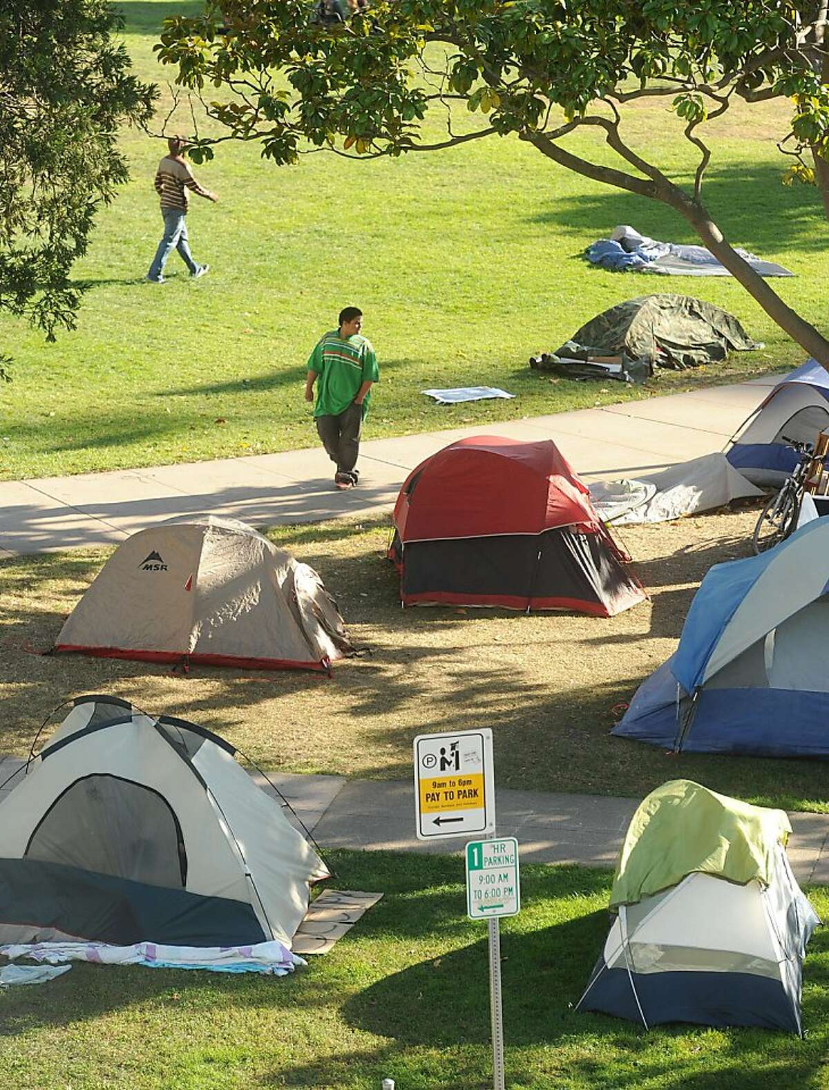 A handful of Occupy Berkeley tents sit in a corner of Civic Center Park in Berkeley, Calif., on Tuesday, Nov. 1, 2011.