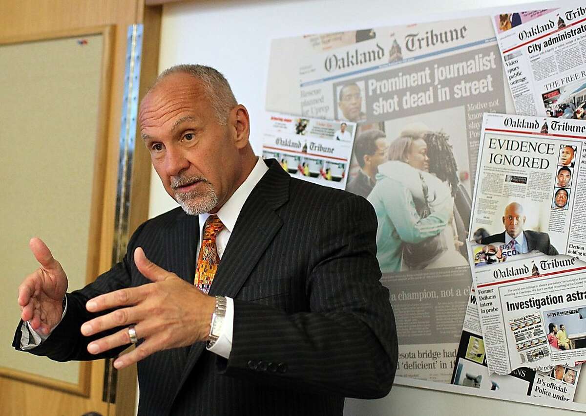 OAKLAND, CA - OCTOBER 27: Mac Tully, president of the Bay Area News Group speaks during a press conference at the Oakland Tribune offices on October 27, 2011 in Oakland, California. The Oakland Tribune announced plans to open community media labs in Oakland with the theme of "Listen. Engage. Learn. Share." The first lab will open in the Oakland Tribune's new downtown offices in 2012 with a satellite office opening on November 1, 2011. The community labs will be places where the community can engage in the journalistic process and will feature computers, blogging stations, wifi, space for meetings and classes taught by news staff. (Photo by Justin Sullivan/Getty Images)