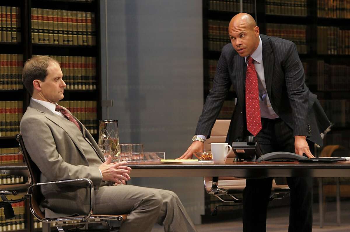Law firm partners Jack Lawson(Anthony Fusco) and Henry Brown (Chris Butler) discuss whether to take on the defense of a wealthy white man accused of raping a black woman in David Mamet's "Race" at ACT