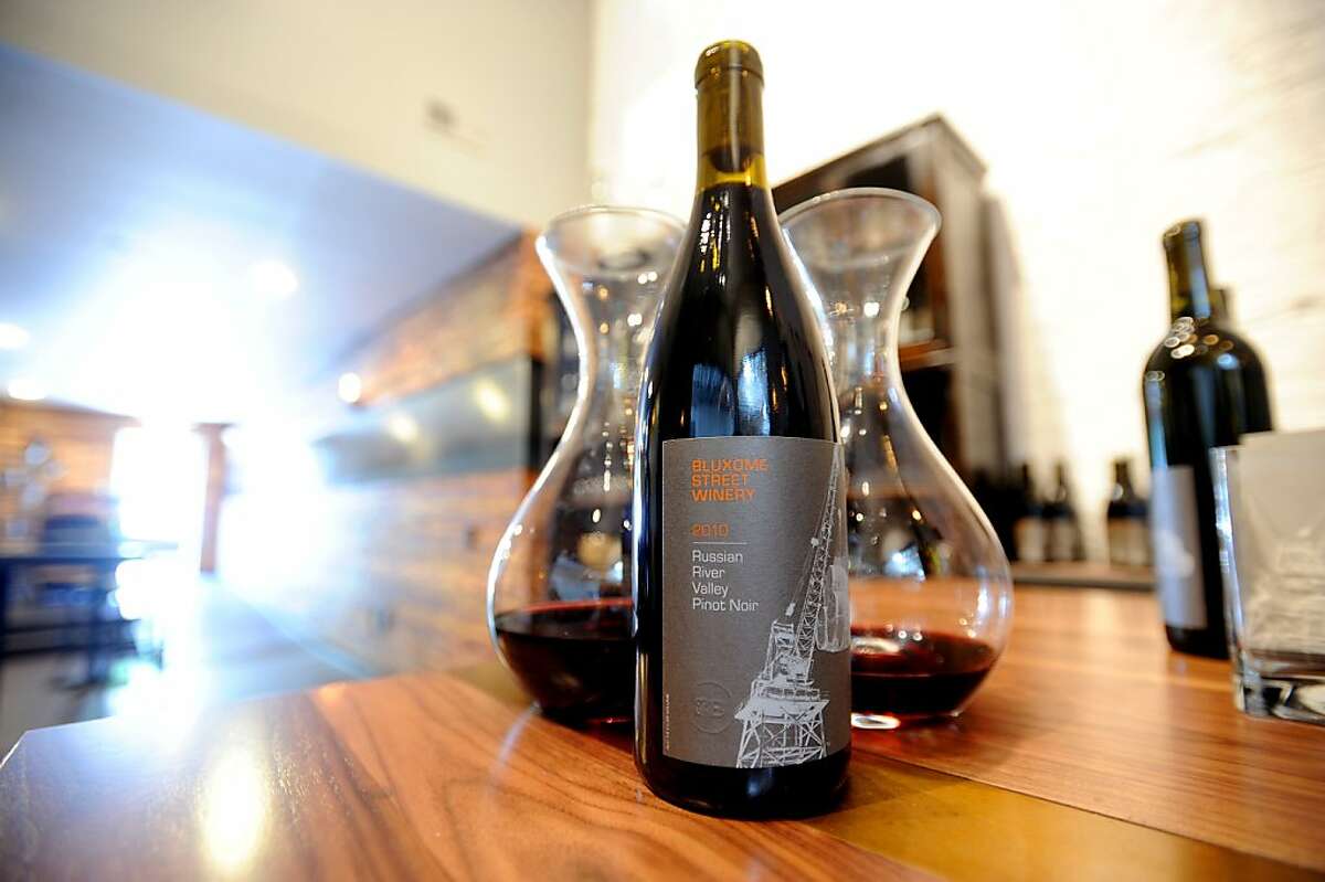 A bottle of Bluxome Street Winery's 2010 Russian River Valley Pinot Noir rests on a counter at the winery's San Francisco tasting room on Wednesday, Oct. 19, 2011.