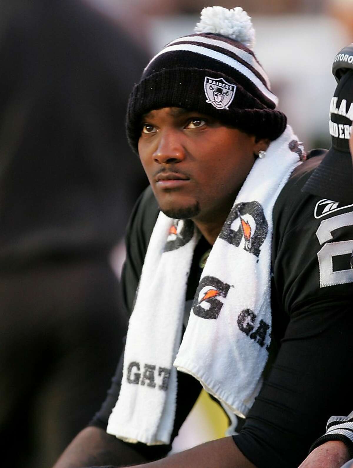 OAKLAND, CA - NOVEMBER 15: (FILE) JaMarcus Russell #2 of the Oakland Raiders sits on the bench after being taken out of their game against the Kansas City Chiefs at Oakland-Alameda County Coliseum on November 15, 2009 in Oakland, California. According to reports on May 6, 2010, the Raiders have released quarterback JaMarcus Russell, drafted overall number one in 2007. (Photo by Ezra Shaw/Getty Images) Ran on: 05-09-2010 JaMarcus Russell