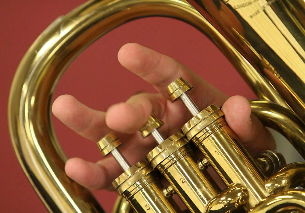 Adrian Quince strikes up the band even 3 of them