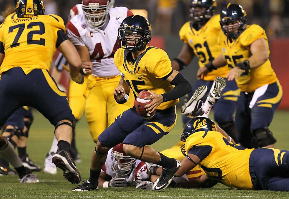 California Golden Bears quarterback Zach Maynard runs out of the pocket during their game with the USC Trojans at AT&T Park on October 13, 2011 in San Francisco, California.