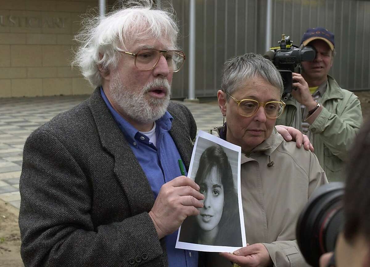 Dan and Susan Cohen of Cape May Court House, New Jersey, hold a picture of their daughter Theodora who was killed in the Lockerbie bomb attack on Pan Am Flight 103, at the entrance to the Scottish Court at Camp Zeist, The Netherlands, Wednesday, May 3, 2000. The trial against two Libyans accused of bombing the airliner over Lockerbie, Scotland opened Wednesday with the two accused pleading innocent. (AP Photo/Peter Dejong) Ran on: 10-21-2011 Dan and Susan Cohen of New Jersey lost their daughter Theodora in the 88 PanAm bombing.