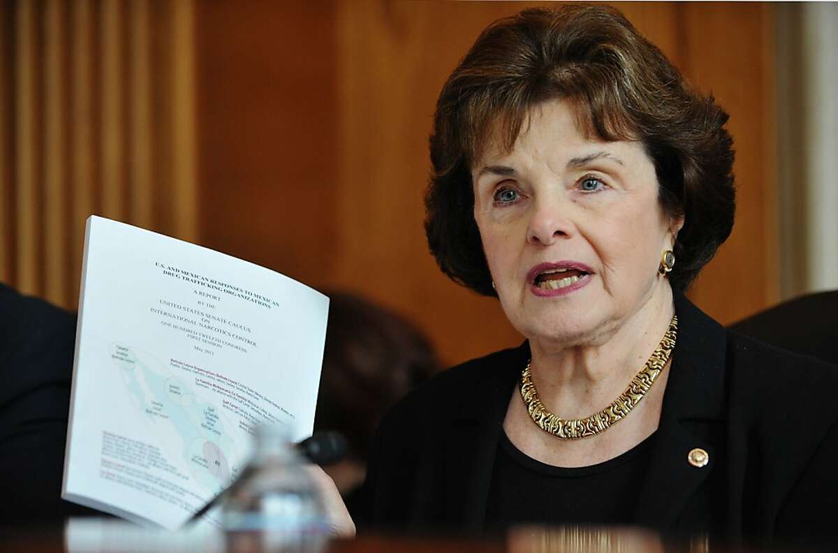 Chairman of the Senate Caucus on International Narcotics Control Senator Dianne Feinstein, D-CA, holds up a copy of the report "US and Mexican Responses to Mexican Drug Trafficking Organizations" at tne Senate Caucus hearing on International Narcotics Control on US - Central America cooperation on efforts combating drug trafficking May 25, 2011 in the Dirksen Senate Office building on Capitol Hill in Washington, DC. The meeting of the Caucus coincided with the release of its report on Mexican drug organizations and US and Mexican responses to them. AFP PHOTO/Mandel NGAN (Photo credit should read MANDEL NGAN/AFP/Getty Images) Ran on: 06-03-2011 Photo caption Dummy text goes here. Dummy text goes here. Dummy text goes here. Dummy text goes here. Dummy text goes here. Dummy text goes here. Dummy text goes here. Dummy text goes here.###Photo: water03_PH1_feinstein1306195200AFP###Live Caption:Chairman of the Senate Caucus on International Narcotics Control Senator Dianne Feinstein, D-CA, holds up a copy of the report "US and Mexican Responses to Mexican Drug Trafficking Organizations" at tne Senate Caucus hearing on International Narcotics Control on US - Central America cooperation on efforts combating drug trafficking May 25, 2011 in the Dirksen Senate Office building on Capitol Hill in Washington, DC. The meeting of the Caucus coincided with the release of its report on Mexican drug organizations and US and Mexican responses to them.###Caption History:Chairman of the Senate Caucus on International Narcotics Control Senator Dianne Feinstein, D-CA, holds up a copy of the report "US and Mexican Responses to Mexican Drug Trafficking Organizations" at tne Senate Caucus hearing on International...