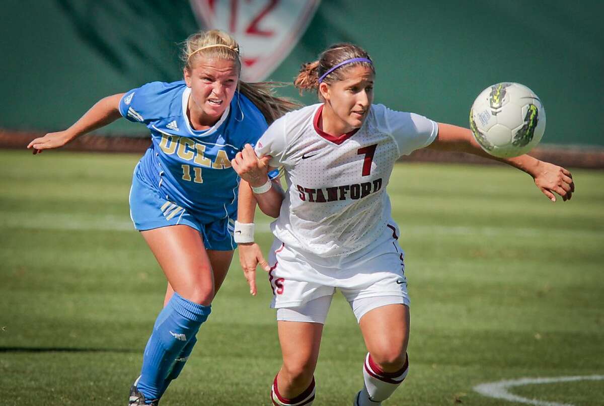Teresa Noyola of Stanford fights for the ball with Chelsea Cline of UCLA in women's soccer at Cagan Stadium at Stanford, Calif., on Sunday, October 9, 2011.