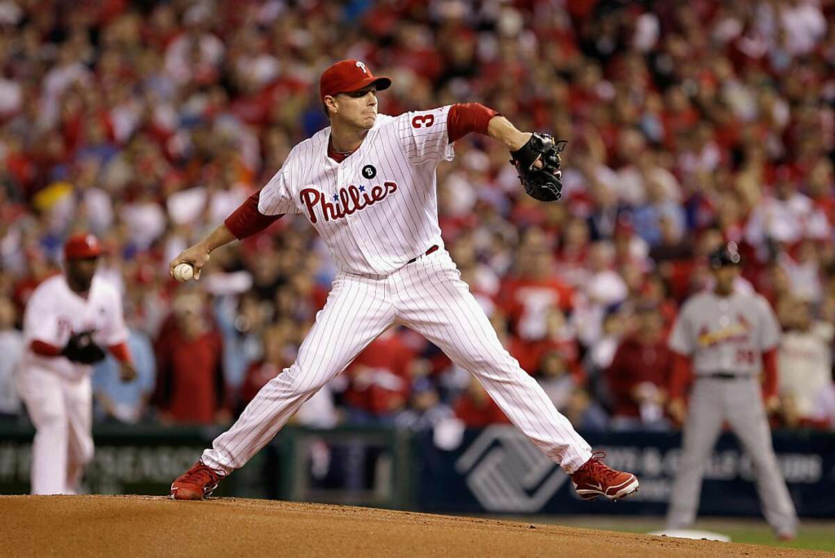 PHILADELPHIA, PA - OCTOBER 07: Roy Halladay #34 of the Philadelphia Phillies throws a pitch against the St. Louis Cardinals during Game Five of the National League Divisional Series at Citizens Bank Park on October 7, 2011 in Philadelphia, Pennsylvania. (Photo by Rob Carr/Getty Images)