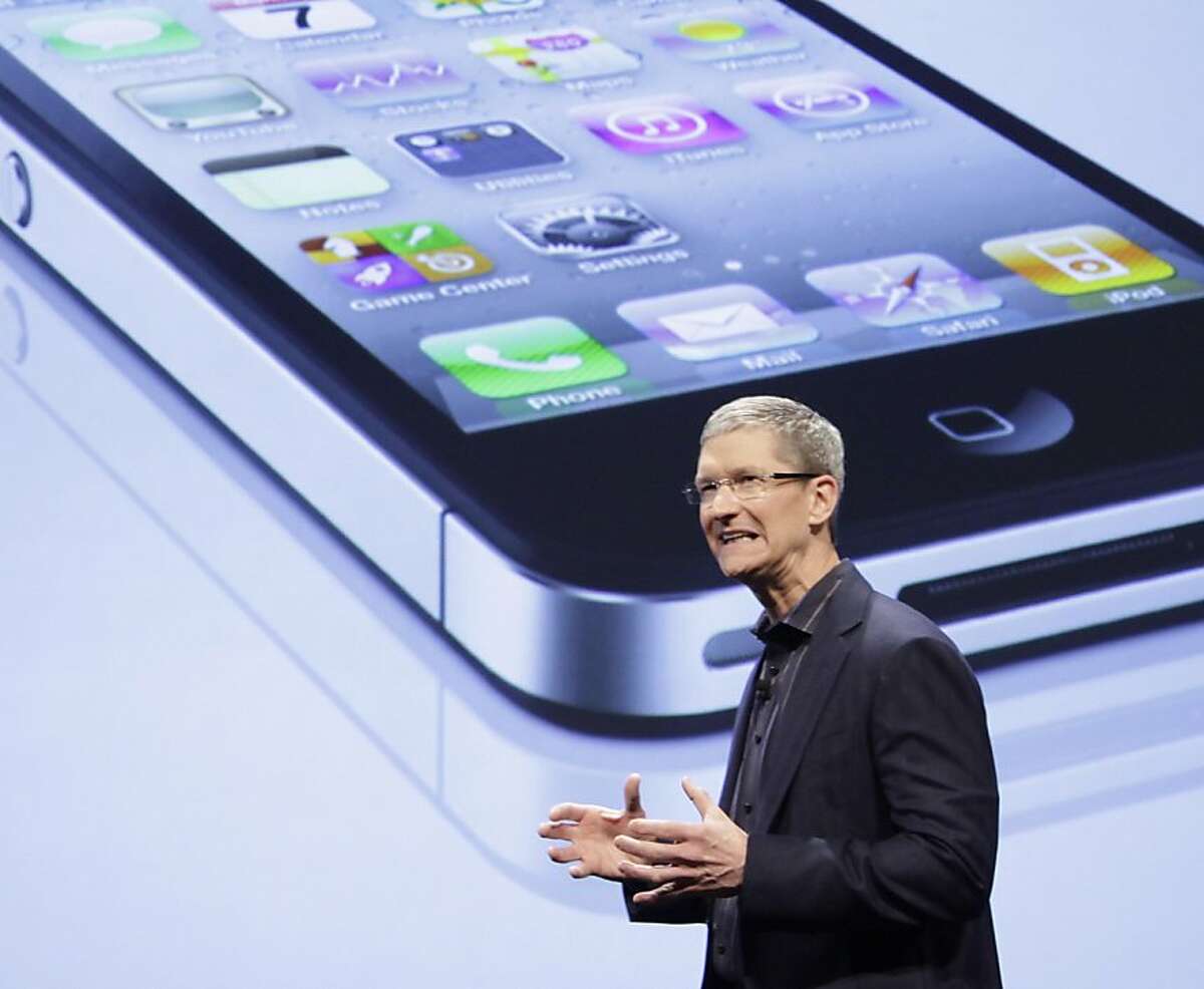 In this photo of Jan. 11, 2011, Tim Cook, COO of Apple, announces that Verizon Wireless will carry Apple's iPhone in New York. If the past is any indication, Tim Cook's mastery of inventory management and his high expectations of employees should leave Apple Inc. in good hands while its charismatic leader, Steve Jobs, takes a?medical leave of absence. (AP Photo/Mark Lennihan) Ran on: 01-19-2011 Tim Cook makes the announcement about the Verizon version of the iPhone last week. Ran on: 02-23-2011 Photo caption Dummy text goes here. Dummy text goes here. Dummy text goes here. Dummy text goes here. Dummy text goes here. Dummy text goes here. Dummy text goes here. Dummy text goes here.###Photo: apple23_cook_PH1294617600AP###Live Caption:In this photo of Jan. 11, 2011, Tim Cook, COO of Apple, announces that Verizon Wireless will carry Apple's iPhone in New York. If the past is any indication, Tim Cook's mastery of inventory management and his high expectations of employees should leave Apple Inc. in good hands while its charismatic leader, Steve Jobs, takes a?medical leave of absence.###Caption History:In this photo of Jan. 11, 2011, Tim Cook, COO of Apple, announces that Verizon Wireless will carry Apple's iPhone in New York. If the past is any indication, Tim Cook's mastery of inventory management and his high expectations of employees should leave Apple Inc. in good hands while its charismatic leader, Steve Jobs, takes a?medical leave of absence. (AP Photo-Mark Lennihan)____Ran on: 01-19-2011__Tim Cook makes the announcement about the Verizon version of the iPhone last week.###Notes:###Special Instructions:JAN. 11, 2011 PHOTO